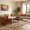 Living room in Pune with Soulwood Ventures’ solid wood sofa, Indian sittings, and center table.